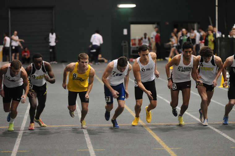 Senior Alex Mason, in the yellow jersey, leaves the starting line during a distance event at the MSSU Lion Invite on Feb. 2 2013.