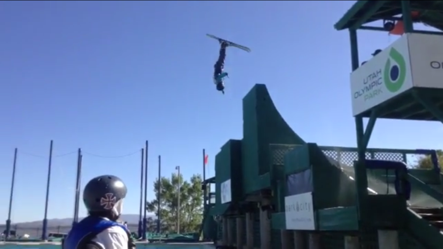 Mariah Johnson takes a practice jump during summer training at the Utah Olympic Park in Park City, Utah.