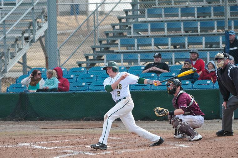 Junior Brandon Weller drives a pitch down the line during the Lions weekend series against Minnesota Crookston. Southern went undefeated over the weekend while Weller piled up eight hits and 10 total bases.