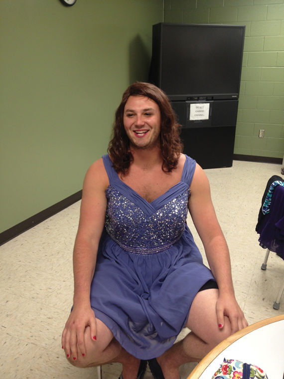 Cody Fire, a contestant in last years Big Man on Campus contest, shows off his beauty gown.