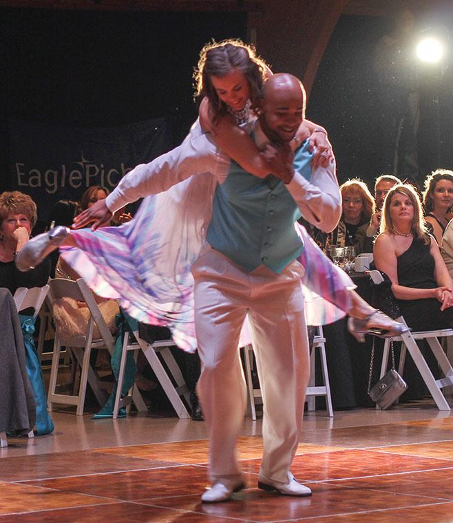 Grace Love, a senior general studies major at Missouri Southern and her partner, Travis Renfro, a certified personal trainer and wellness coach, perform a well executed ariel move for their first of two dances of the evening at Joplin Dancing with the Stars at the Downstream Casino, in Quapaw, Oklahoma on Friday, March 29.