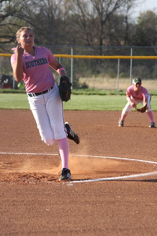 Sophomore+pitcher+Haley+Kinnison+puts+all+her+effort+in+a+pitch+against+Rogers+State+in+the+annual+Pink+game+at+Kungle+Field+on+Tuesday%2C+April+22%2C+2014