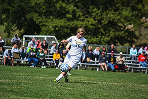 Junior forward Karley Thomas plays a ball during the Lions 0-0 tie against Lindenwood at Hal Bodon Field on Oct. 6, 2013. The Lions shot 27 times but failed to score and the game ended in a tie in double overtime.
