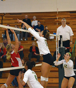Juniors Payton Graves (middle) and Abby Finder (right) defend during the Lions contest against Central Missouri at home during senior night on Oct. 29, 2013. The Lions lost 3-0.