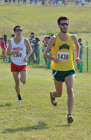 Senior distance runner Colton Wooldridge makes his way to the finish line following his run at the Southern Stampede on Sept. 20, 2014, hosted by the Missouri Southern. The Lions finished in third place overall while Wooldridge came home in 29th position.
