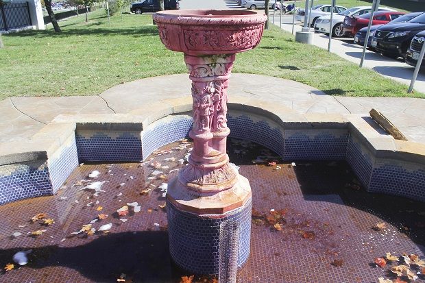 The Dennis Weaver Memorial Fountain, which was dyed red Oct. 30, sits outside the Ralph L. Gray Alumni Center.