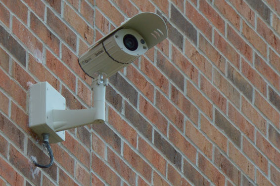 One of the new security cameras watches the campus from Webster Hall.