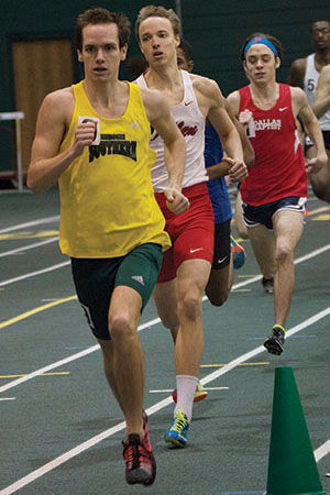 Junior Ben Grant leads the pack around the track inside the Leggett & Platt Athletic Center during the Southern-held MSSU Open on Jan. 21. The meet was headlined by the newly elected team captains, Jacob Rowe and Jeff Fraley, performances.