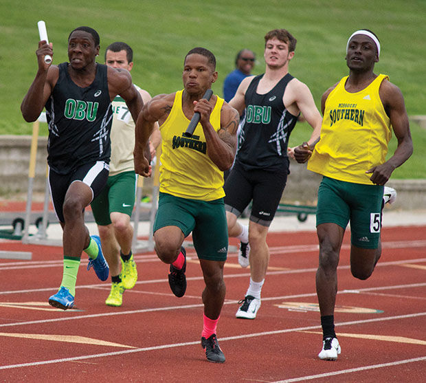 Jazz+Allen%2C+Erron+Holley%2C+Desmond+Williams%2C+and+Jeff+Fraley+came+out+with+a+first+place+during+the+mens+4x100+meter+relay.
