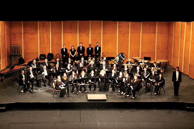 The Southern Wind Ensemble poses for a group photo before their performance on March 10, 2015. The ensemble will perform with the concert band at 7:30 p.m. on April 20, in Taylor Performing Arts Center.