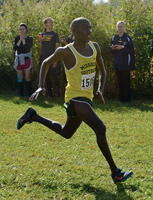 Freshman Vincent Kiprop striding ahead at the Tom Rutledge Cross Country Course on Sept. 19, 2105. Kiprop won the race, which was his first ever collegiate race. He won in a time of 24:15.96. The men’s team finished in 14th place. The women’s team placed in fifth place. Emily Harris led the way for the Lions with a seventh place finish.