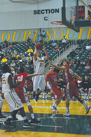 Senior DJ Feitl shooting an uncontested layup against season opening opponent St. Cloud State inside The Leggett & Platt Athletic Center on Nov. 13, 2015. Feitl scored a season-high 18 points in the Lions victory. Feitl has started all six games for Southern this season. Feitl is averaging 9.8 points a game.