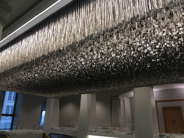 Dog tags are on display at Chicago Public Library. They are representative of deaths during the Vietnam War. The display is only one of two in the U.S. to list all lives lost during the war. 