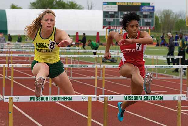 Sophomore+Lexie+Pesek+clearing+a+hurdle+on+the+MSSU+Track+at+Fred+G.+Hughes+Stadium+in+the+Bill+Williams%2FBob+Laptad+Invitational+on+Apr.+24%2C+2015.+Pesek%E2%80%99s+best+finish+this+outdoor+season+came+in+the+SBU+Bearcat+Invite+where+she+placed+5th+with+a+time+of+16.04.+Her+personal+best+is+15.75+set+in+the+David+Suenram+Gorilla+Classic+last+weekend.
