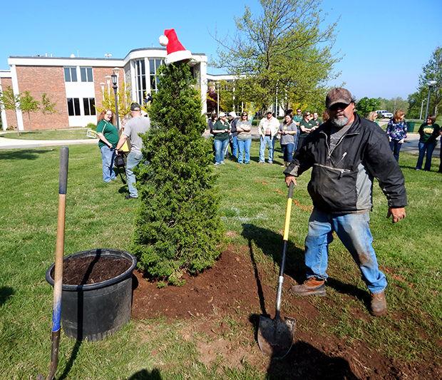 As part of Earth Day, a tree planting ceremony took place on the Oval. The seven ft. juniper tree was purchased and planted by Don Buck and Steven and Michael McDonald from Ozark Nursury. The extremely sturdy tree will grow to an estimated height of 15-20 feet and will also function as a Christmas Tree in December with lights and ornaments. Theresa Shufflin, Staff Senate and Kelly Wilson, director of advising, counseling, and testing spoke at the event. 