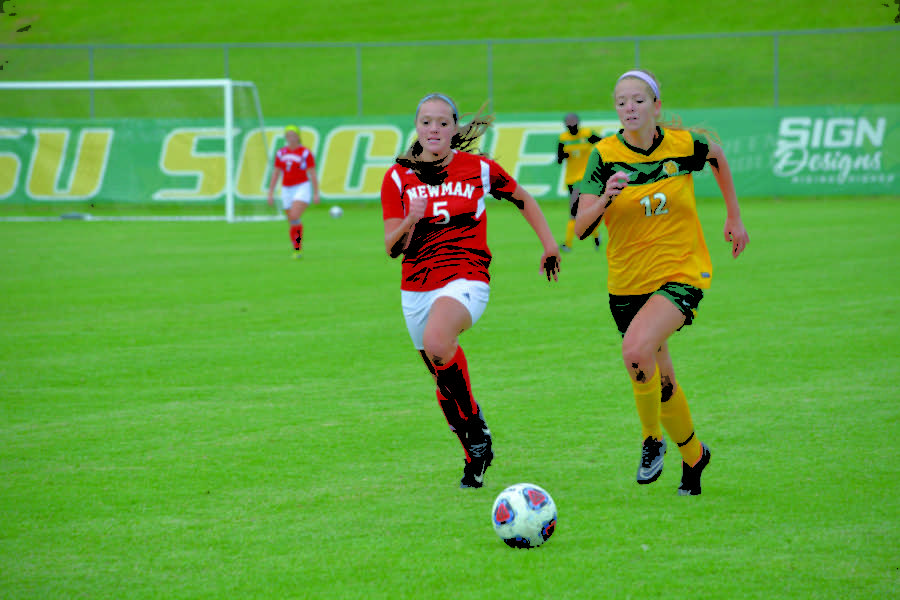 Sophomore Bailey North trying to outrun her opponent to the ball on Sept. 12, 2015 against Newman University at Hal Bodon Field. North played in nine matches last season starting seven before suffering a season ending injury.