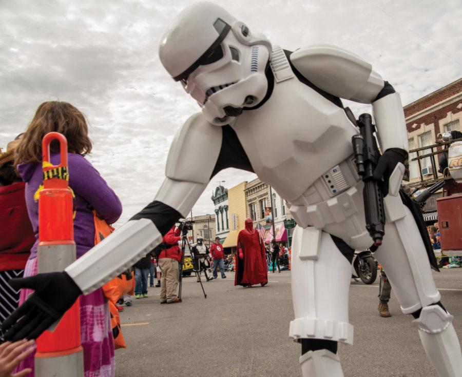 A Storm trooper shakes the hand of a young Maple Leaf Parade attendee ahead of the December premiere of Star Wars: The Force Awakens. Similar groups and performers are expected to make their way down the parade route for this year’s Maple Leaf Parade, which will take place on October 15 in Carthage, MO.