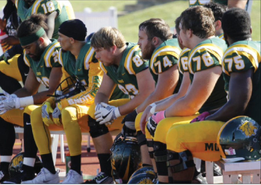 Several Missouri Southern offensive players look on from the bench with the blank faces inside Fred G. Hughes Stadium on Oct. 8, 2016 against Washburn on Homecoming. Southern would go on to lose that game marking their third straight homecoming game loss.  