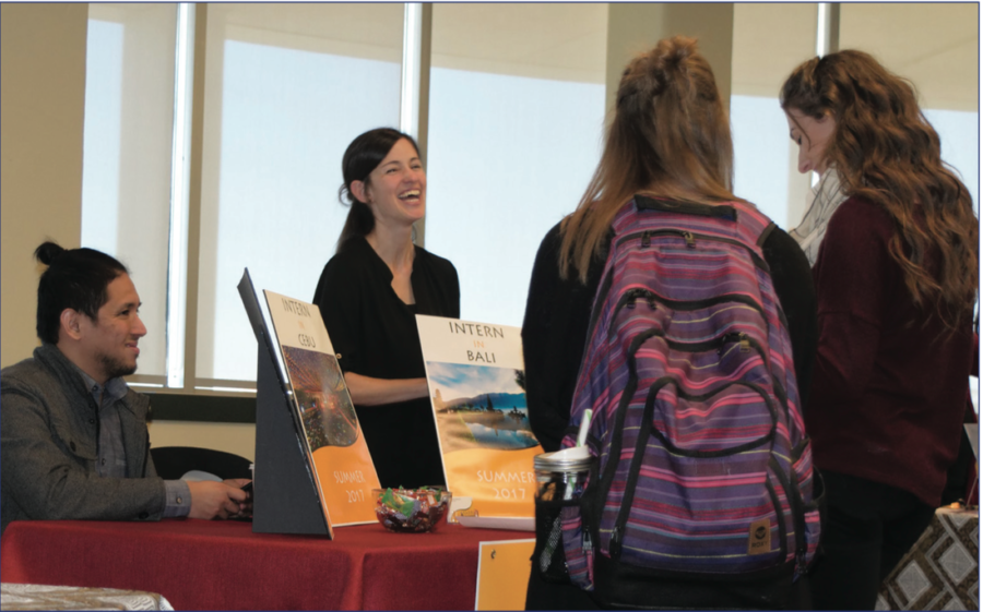 Students talk with representatives responsible for giving out information on the 2017 internships on the island provences of Bali, Indonesia and Cebu, Philippines during the Institue of International Studies’ study abroad fair, on Nov. 9, 2016 in the Billingsly Student Center’s Connor Ballroom. 