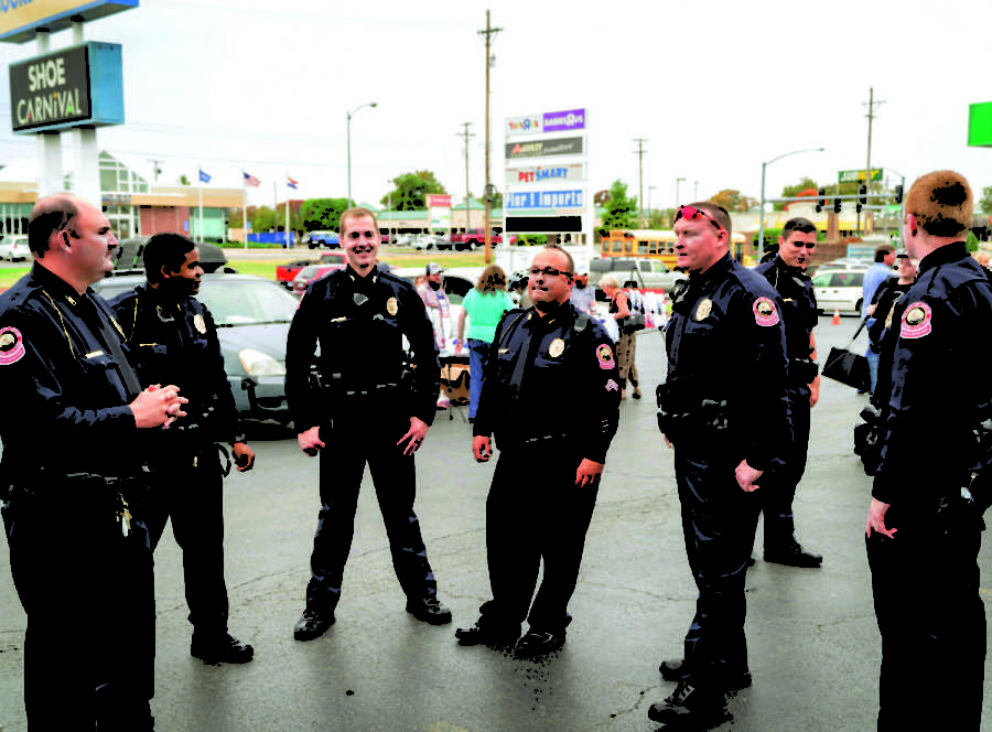 JPD officers stand guard outside Books-A-Million in Jop- lin, MO. on Oct. 22, 2015, for a Ben Carson book signing. 