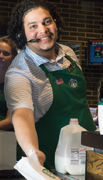 Bryan Rivera serving customers