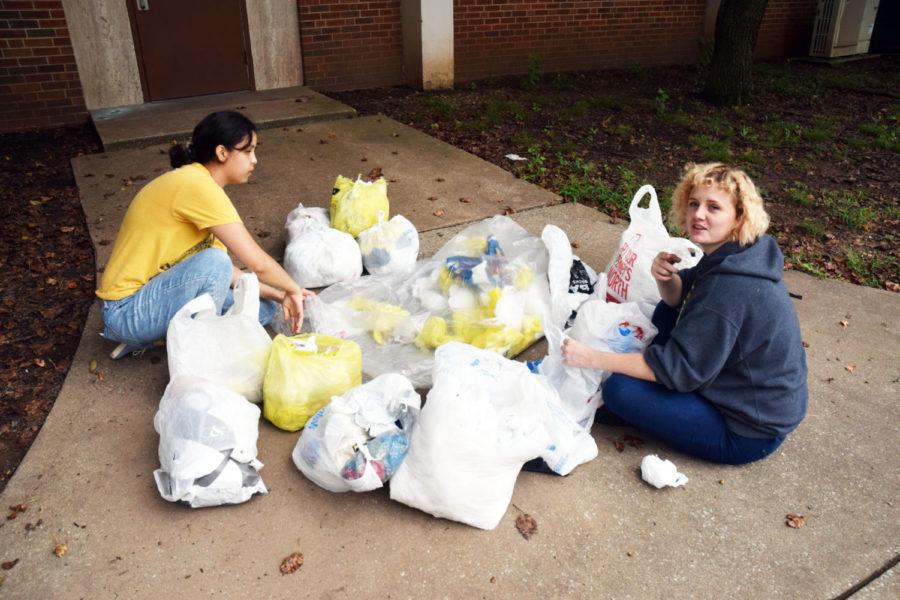 Margarita Antillon (left) and Casandra Williams, art students at Missouri Southern, working on an art project for Focal Point. 