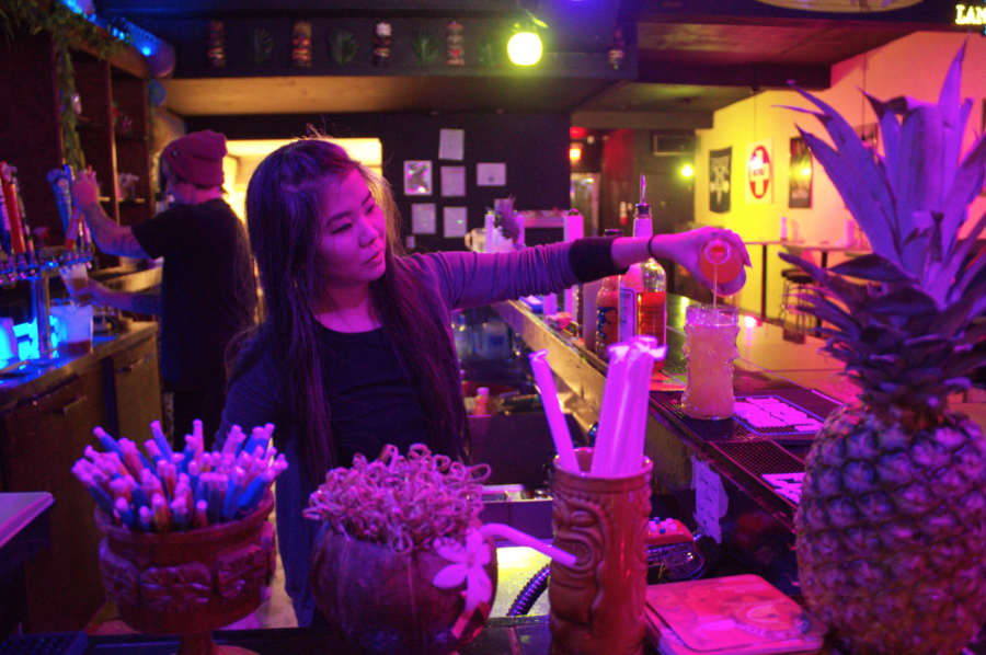 Blythe Whitaker whips up a drink at Hubbas Hideout Tacos and Tiki Bar located in downtown Joplin