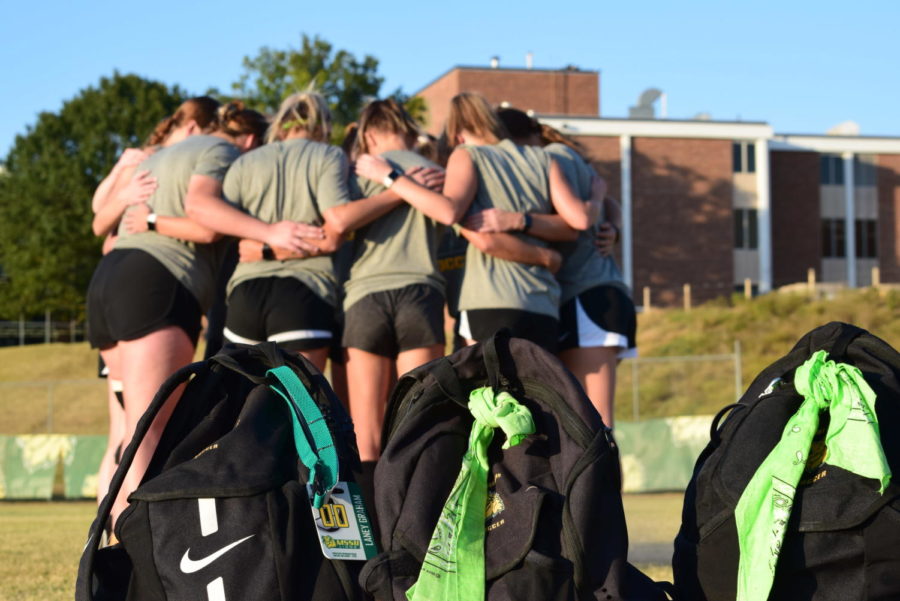 After practice, members of the womens soccer team huddle on Oct. 6, 2022. Senior Riley Lever, SAAC President, initiated the adoption process of The Bandana Project on MSSUs campus for all students.