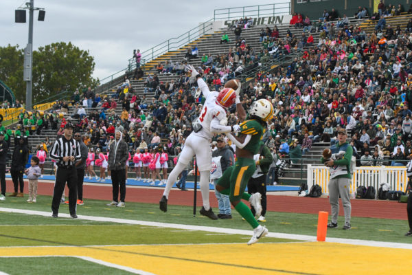 Deontay Campbell makes a one handed catch over Jaylen Fuksa at Fred G Hughes stadium in Joplin, Mo on Oct. 14, 2023
