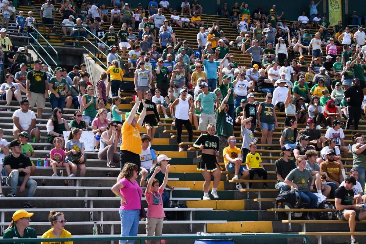 Lions fans cheer the team on at Fred G. Hughes stadium on September 23,2023
