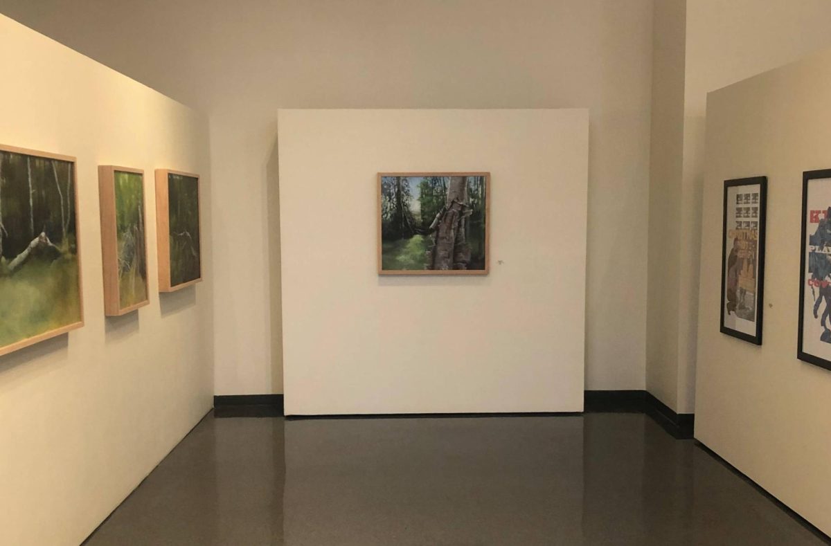 The exhibit features many kinds of art on display including paintings