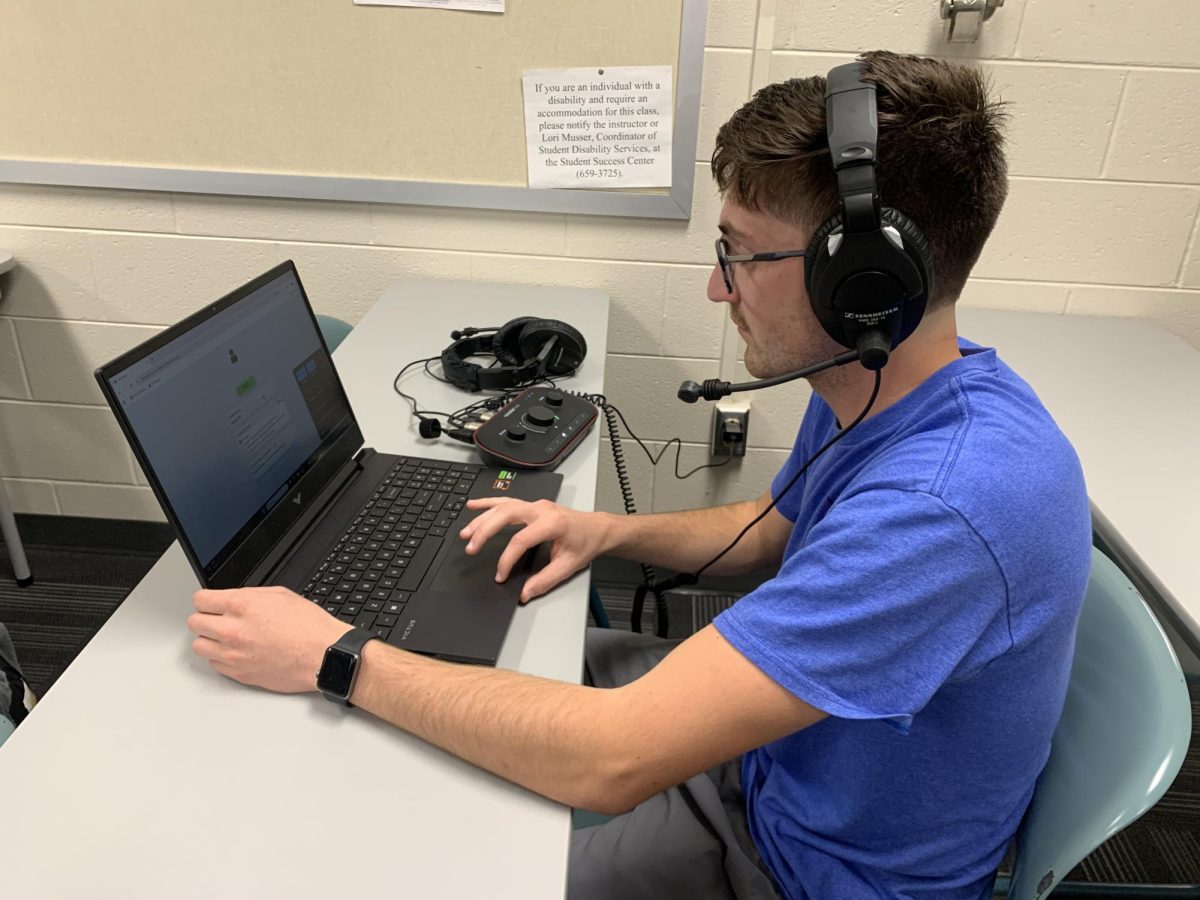 Nathan Reynolds demonstrates the broadcasting equipment used for the MIAA championships. April, 10 2026